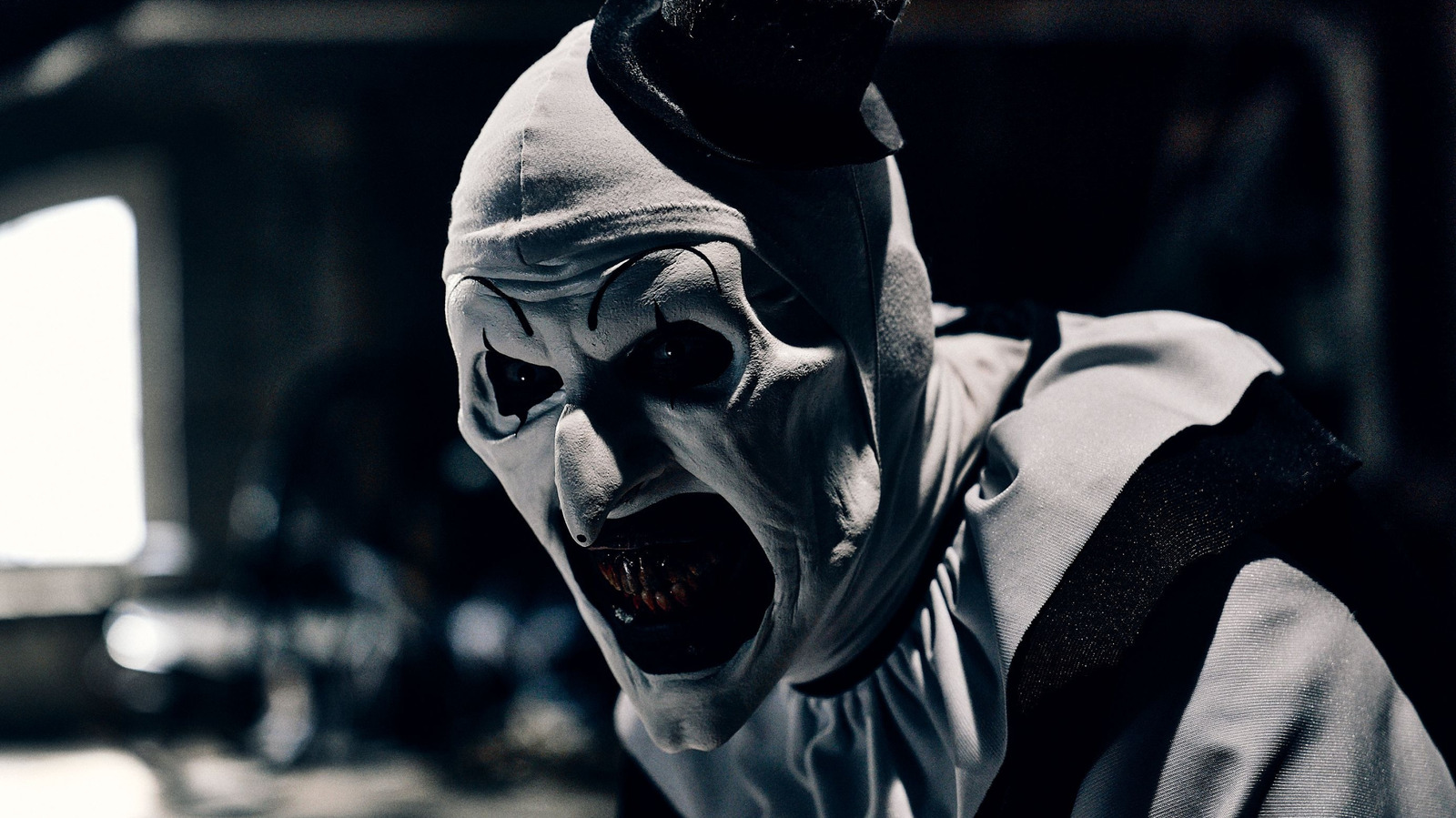 O final de Terrifier 3 era originalmente muito mais sombrio e revela arte The Clown Acto